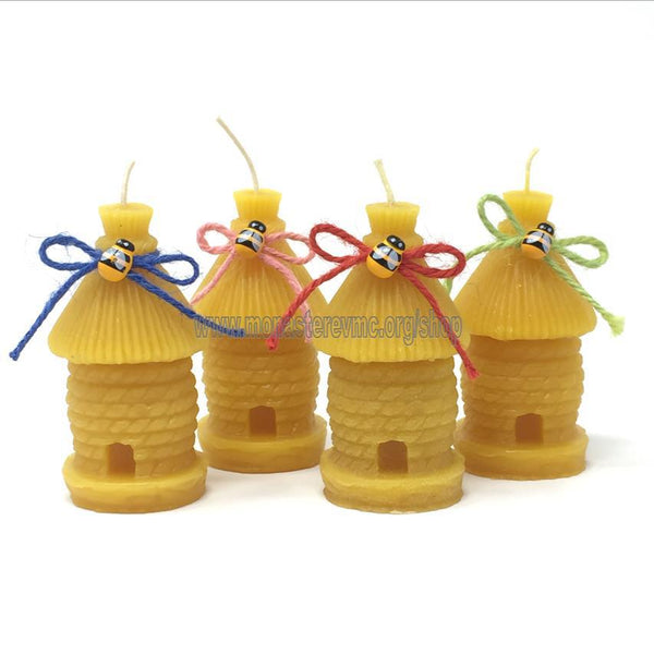 Natural Beeswax "Rope woven skep" candle handmade and decorated in Canada by the sisters of monasterevmc.org/ Chandelle "La Ruche" en cire d'abeille naturelle fabriquée et décorée à la main au Québec par les soeurs du monasterevmc.org