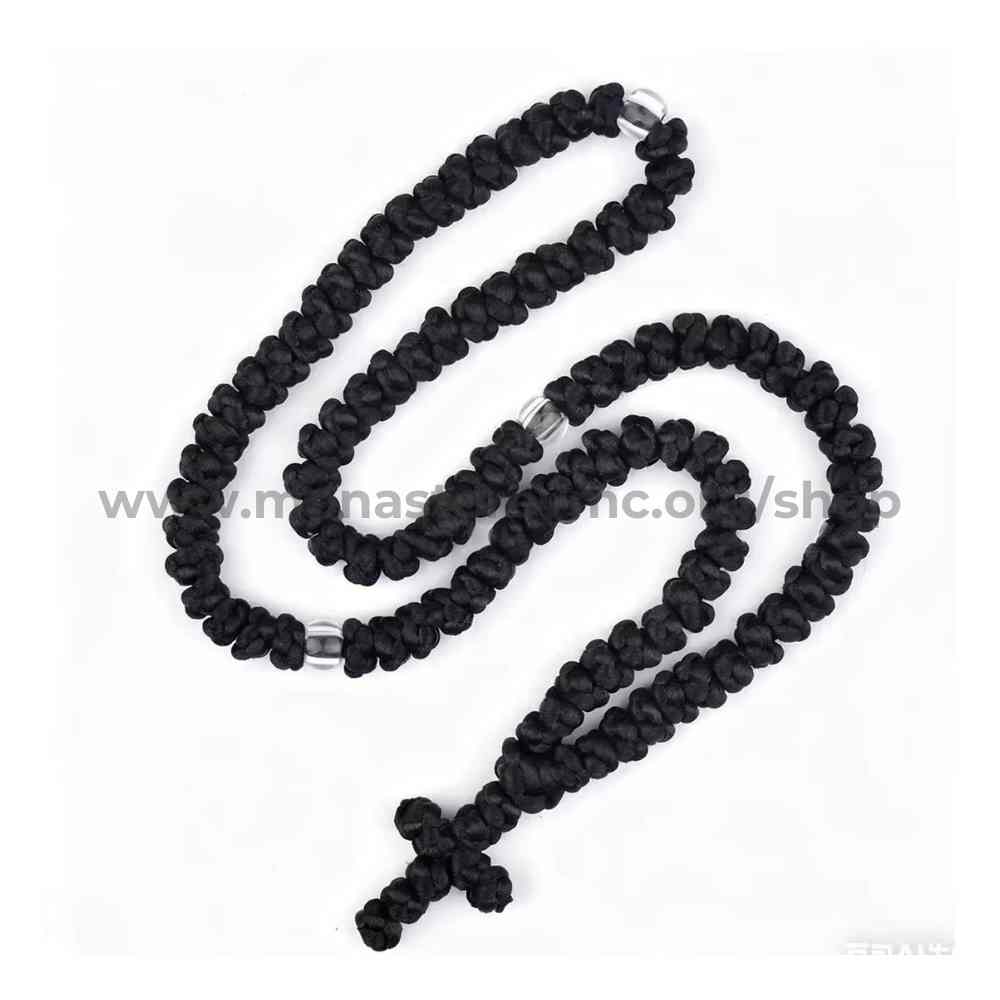 Black orthodox rosary necklace with a cross pendant on a white background