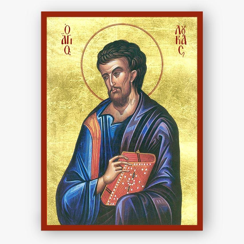 Icon of Evangelist Luke holding a book on a gold background