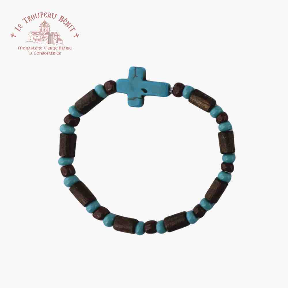 Children's Christian Orthodox bracelet with beads in turquoise and brown colors with Troupeau Benit logo in the top right corner