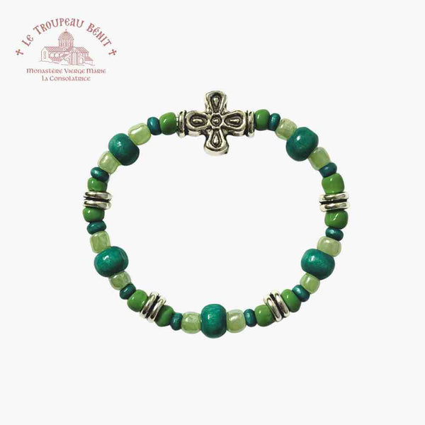 Bead bracelet in the green tones with Troupeau Benit logo in the top right corner