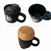 Black mug with cork base featuring a white cross and text on a white background sold by the sisters of monasterevmc.org