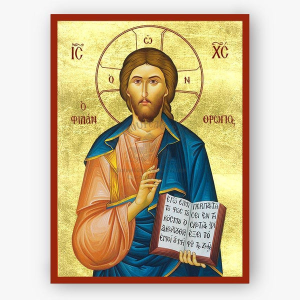 Icon of Christ Philanthropos holding a book with text, framed by gold and red elements.