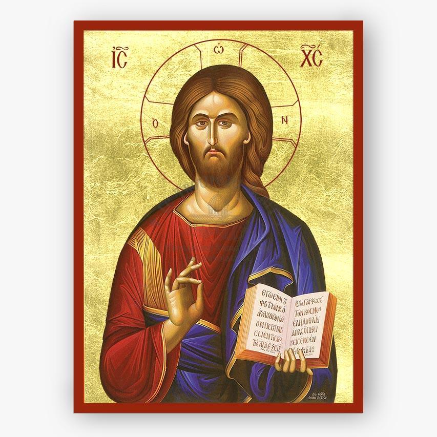 Icon of Christ the Teacher holding a book on a gold background