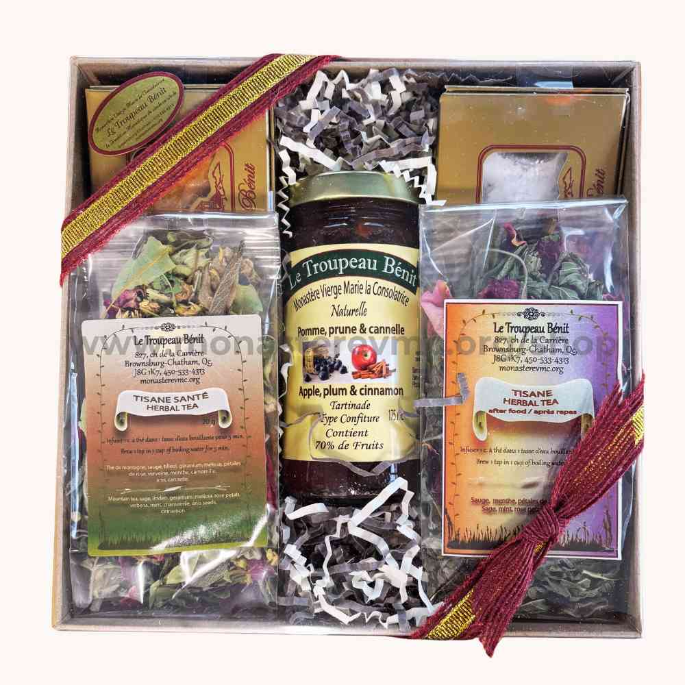 Gift set with herbal tea, jam and cookies packaging, tied with ribbon