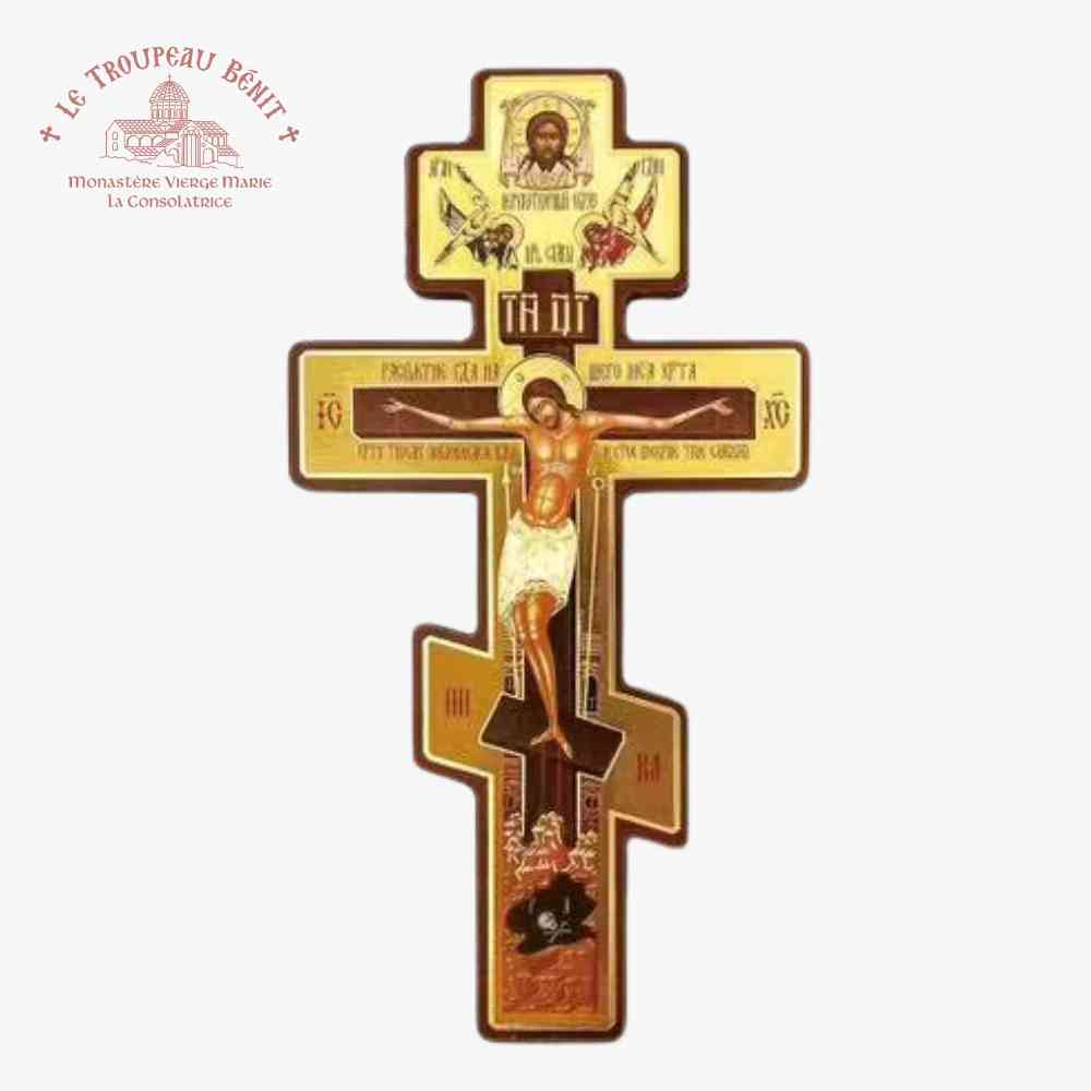 Decorative cross with religious iconography on a white background with 'Troupeau Benit' logo branding