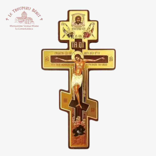 Decorative cross with religious iconography on a white background with 'Troupeau Benit' logo branding