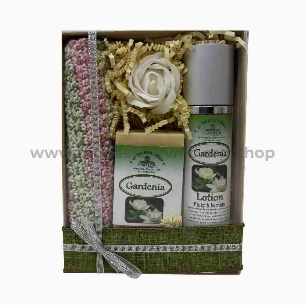 Gardenia-themed gift set with lotion, soap, and bath towel in a box.
