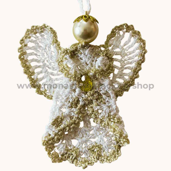 Decorative crochet angel ornament with gold and white details on a white background