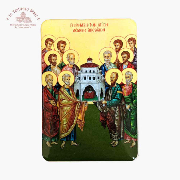 Decorative plaque with religious artwork of saints and a building, featuring the 'Troupeau Benit' logo