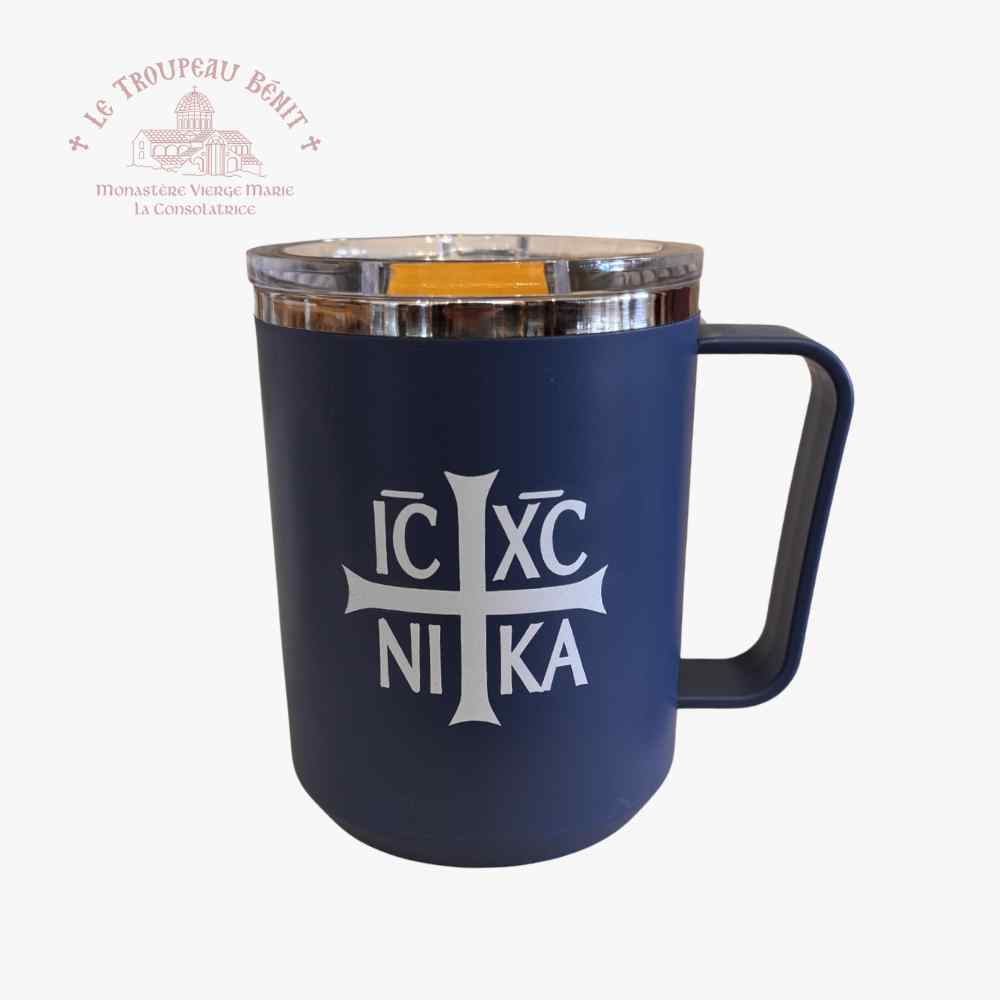 Blue mug with white cross and IC XC NI KA on a white background, featuring Le Troupeau Bénit logo.