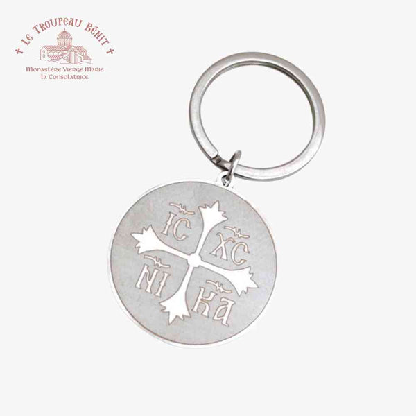 Silver keychain with engraved IC XC NI KA and Cross symbols on a white background with 'Troupeau Benit' logo branding