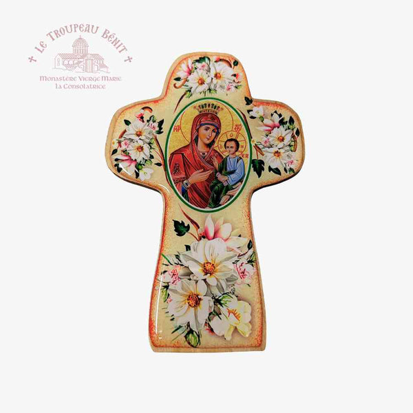 Decorative cross with religious icon and floral design on a white background with 'Troupeau Benit' logo branding