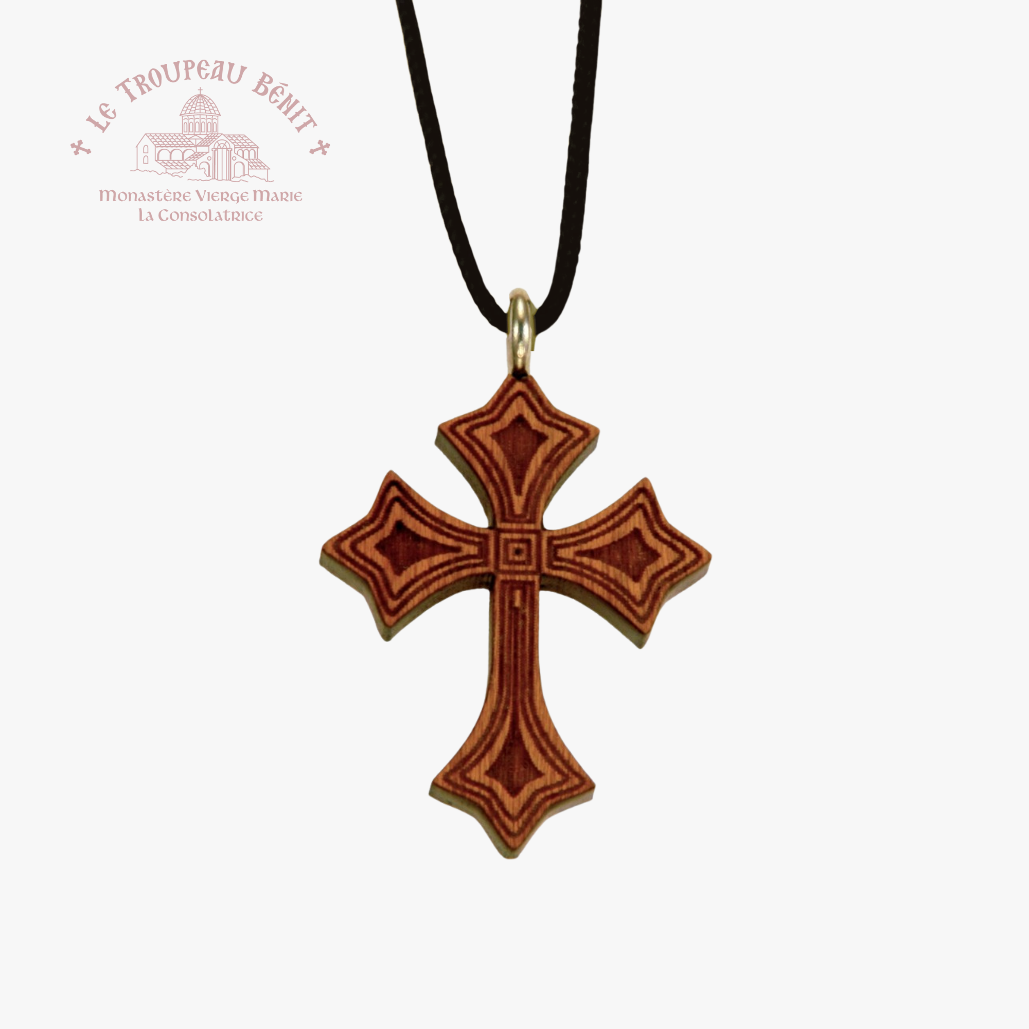 Wooden cross pendant on a black cord with a white background with 'Troupeau Benit' logo branding