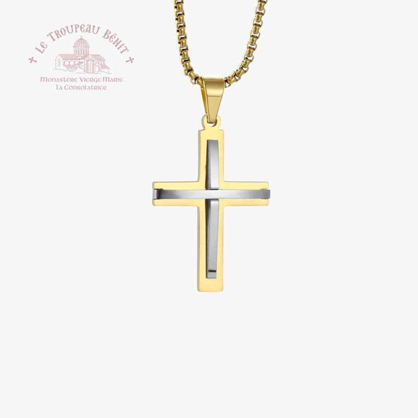 Gold and silver cross pendant on a white background with Le Troupeau Benit logo.