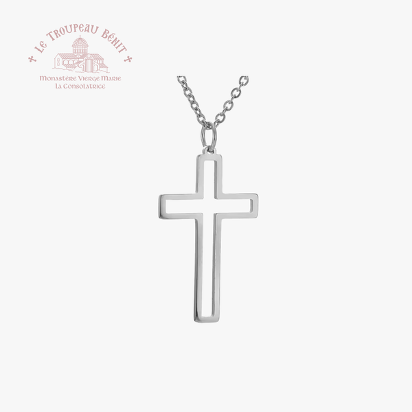 Silver cross necklace on a white background with 'Le Troupeau Bénit' branding.
