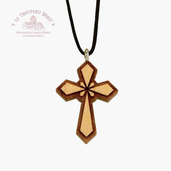 Wooden cross pendant on a black cord with a white background and 'Troupeau Benit' logo branding