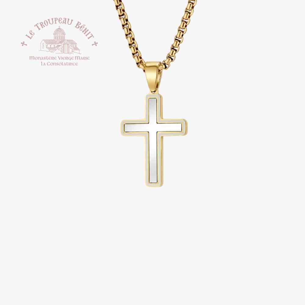 Gold cross pendant necklace on a white background with Le Troupeau Benit logo.