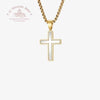 Gold cross pendant necklace on a white background with Le Troupeau Benit logo.