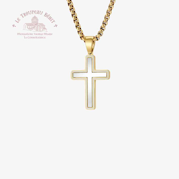 Gold cross pendant necklace on a white background with Le Troupeau Benit logo.