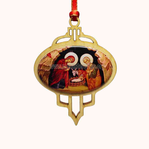 Decorative Christmas ornament with nativity scene design on a white background