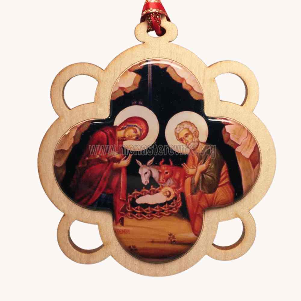 Decorative Christmas ornament with nativity scene design on a white background
