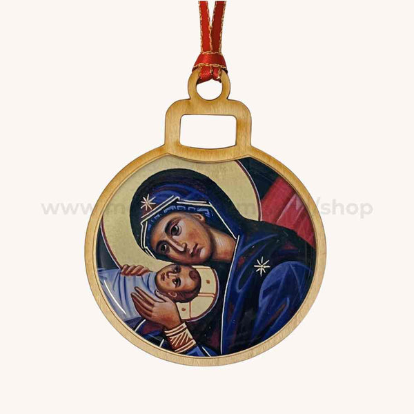 Nativity round ornament with religious icon of Virgin Mary holding Christ, on a white background