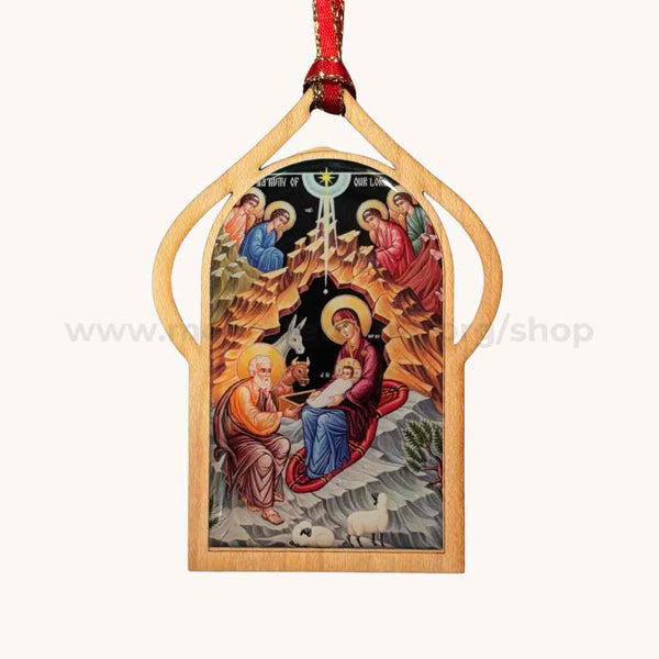 Decorative icon of the Nativity scene with wooden frame and red ribbon on a white background.