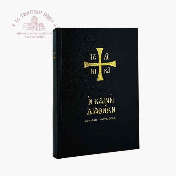 Black book with gold text and cross symbol on a white background with Troupeau Benit logo branding