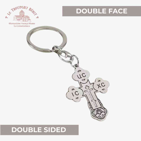 Silver keychain with double-sided design on a white background with 'Troupeau Benit' logo branding