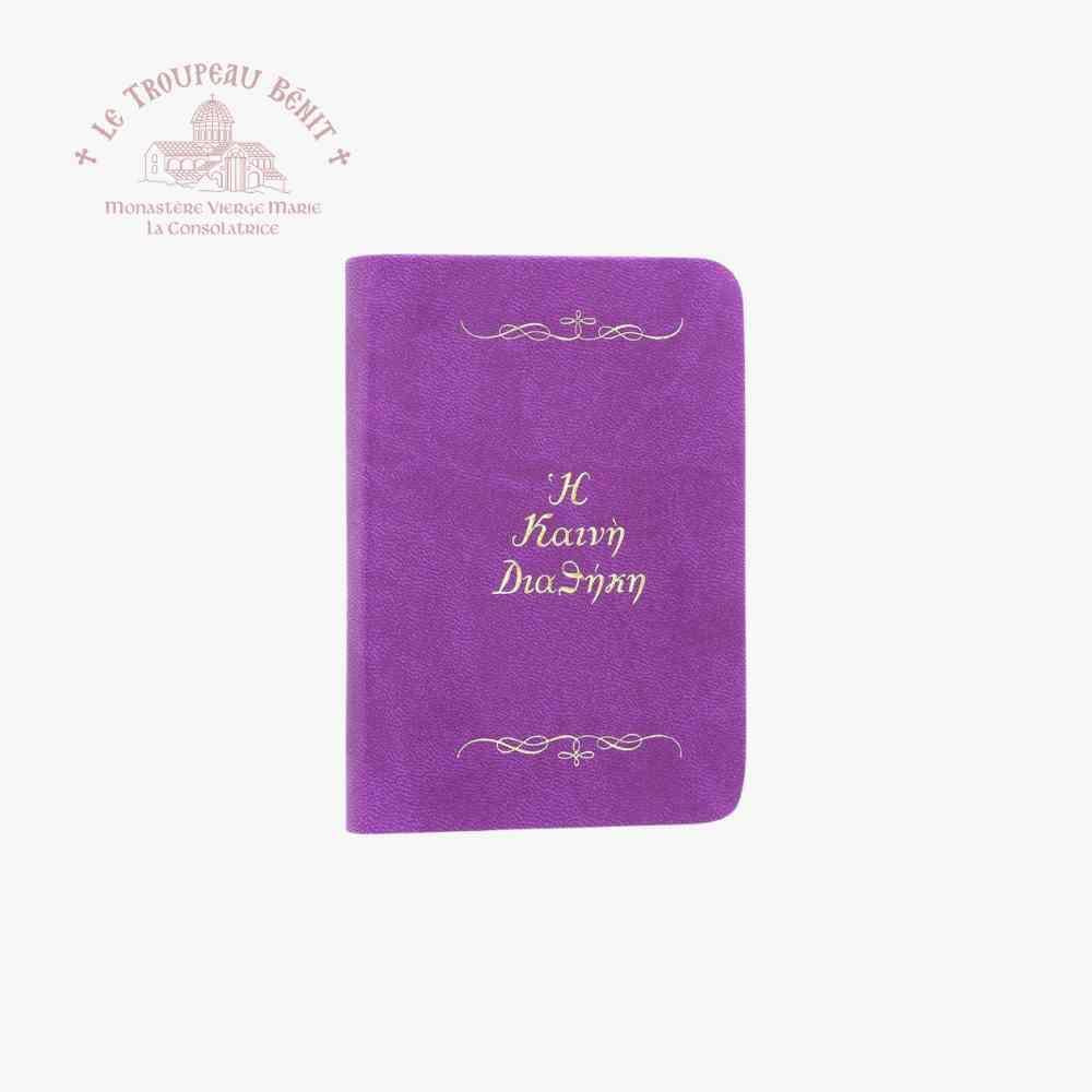 Purple book with gold text on a white background, featuring the logo of Le Troupeau Bénit.