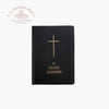 Black book with gold cross and text on a white background, with Troupeau Benit logo in the corner.
