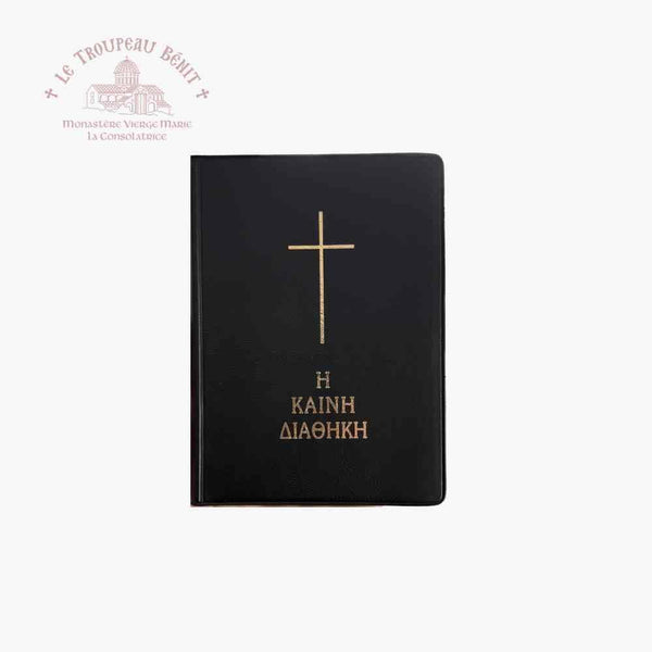 Black book with gold cross and text on a white background, with Troupeau Benit logo in the corner.