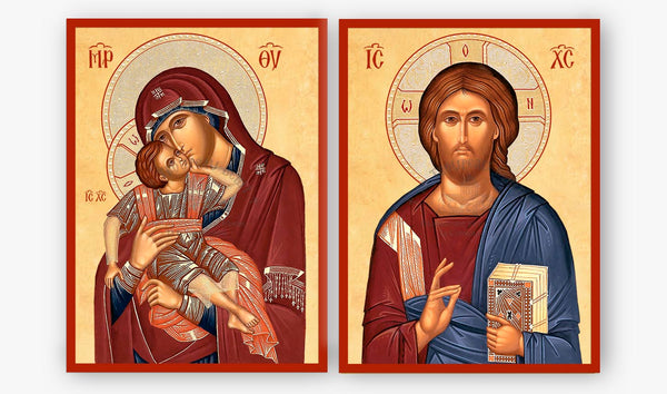 A two-panel religious icon set showing the Virgin Mary holding the infant Jesus on the left and Jesus Christ on the right, rendered in traditional Byzantine-style painting with gold backgrounds and red-brown robes.