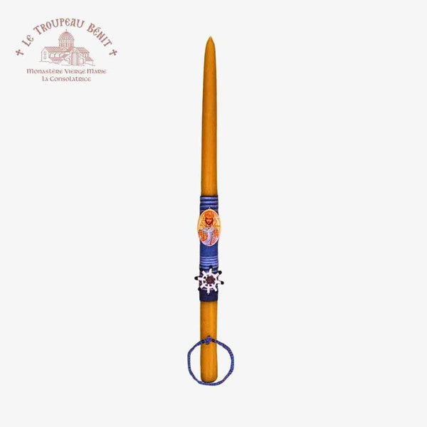 Decorative candle with a blue band featuring a design, on a white background with "Troupeau Benit" logo branding