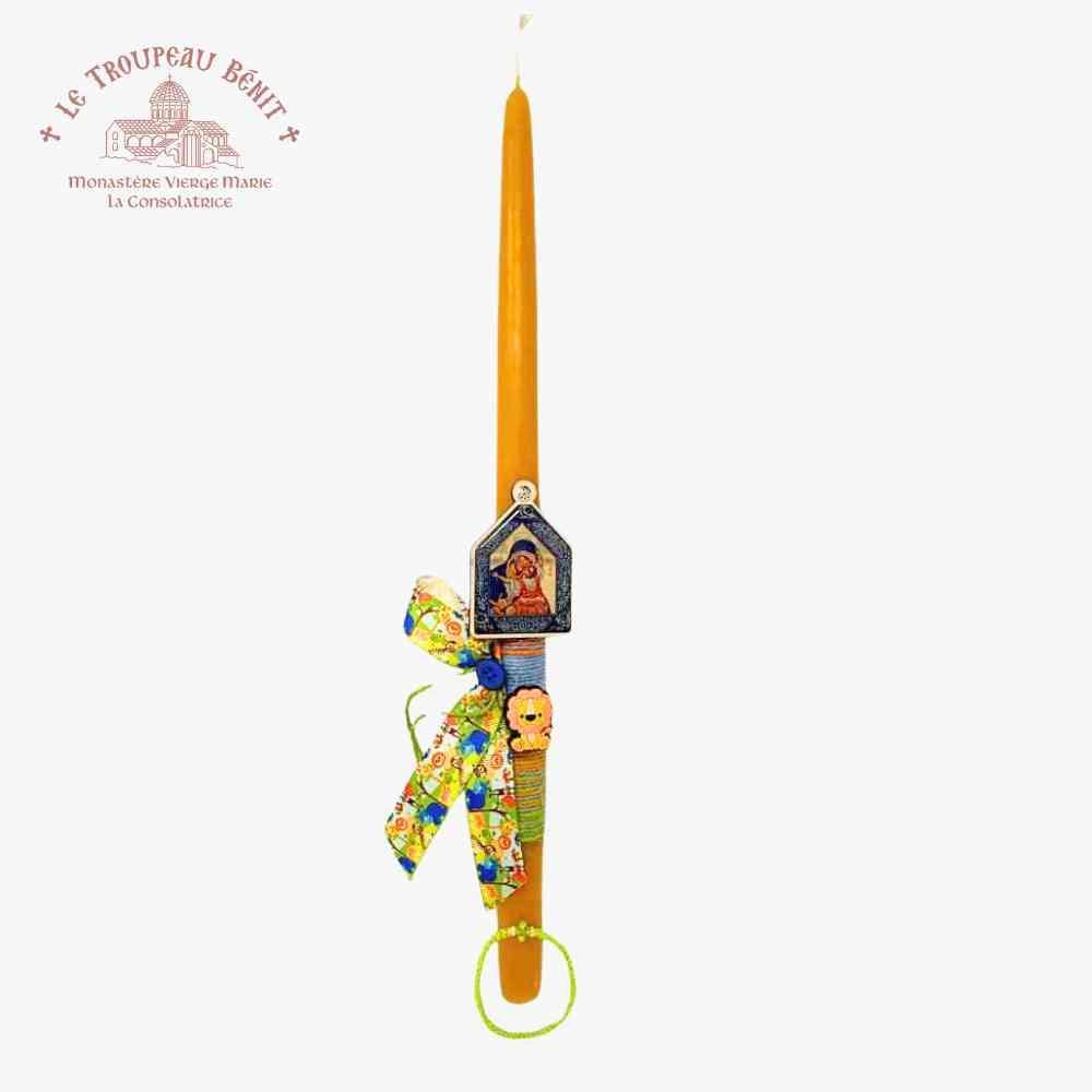 Taper candle with Orthodox icon of the Mother of God and prayer rope on a white background, featuring Le Troupeau Benit logo.