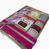 Gift set with 'Rose' branded products including lotion and hand cream in a decorative box.