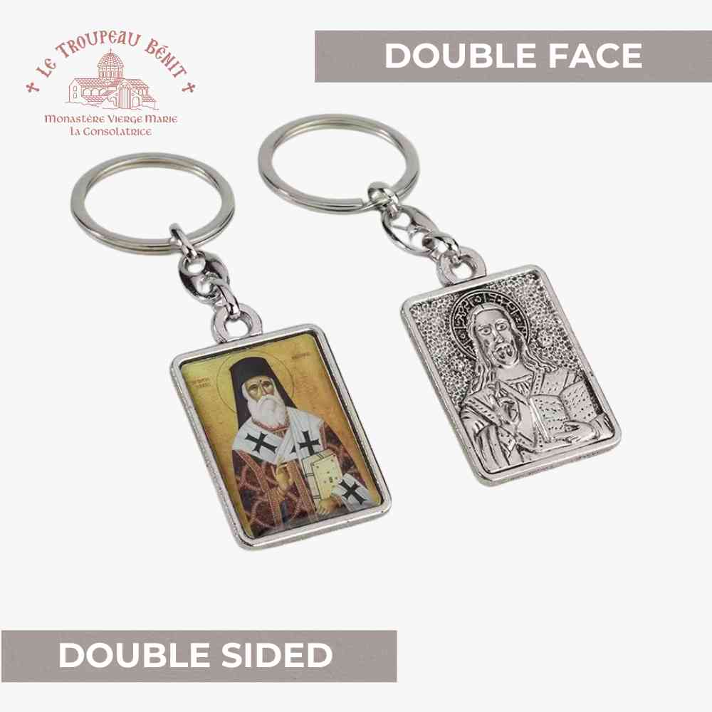 Double sided keychain with Saint Nektarios and Christ with visible 'Troupeau Benit' logo branding
