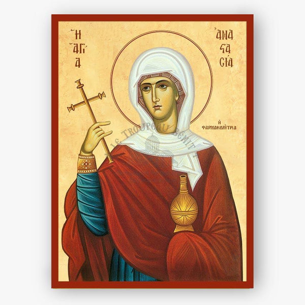 Icon of Saint Anastasia the deliverer of potions holding a cross and a vase on a beige background