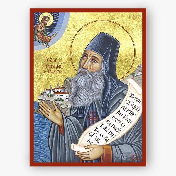 Icon of Saint Silouan the Athonite with a scroll and a landscape in the background on a gold background