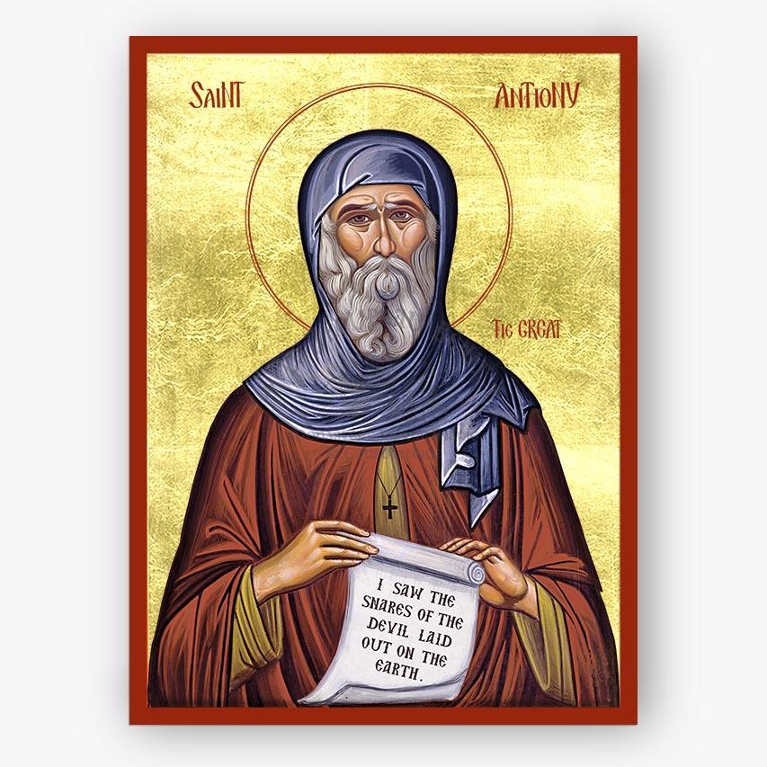 Icon of Saint Anthony of Egypt holding a scroll on a gold background with the English writing of the name.