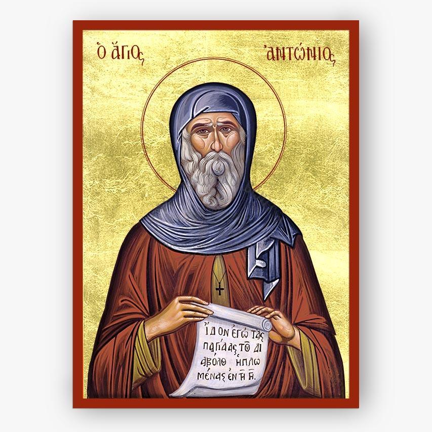 Icon of Saint Anthony of Egypt holding a scroll on a gold background