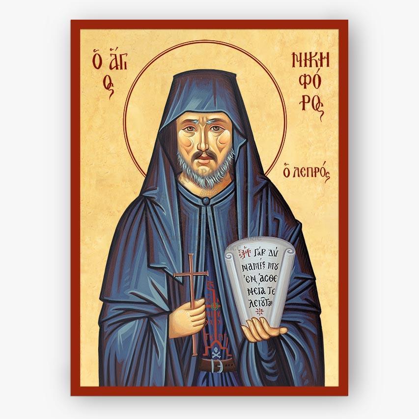 Icon of Saint Nikephoros the leper holding a cross and a scroll with text, framed with decorative elements.