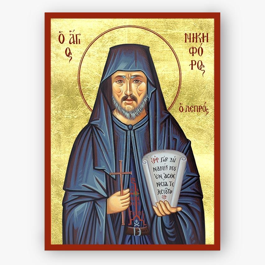 Icon of Saint Nikephoros the leper holding a cross and a book with gold background