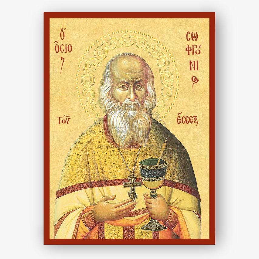 Saint Sophrony icon wearing a cross and holding a holy cup on a beige background. 