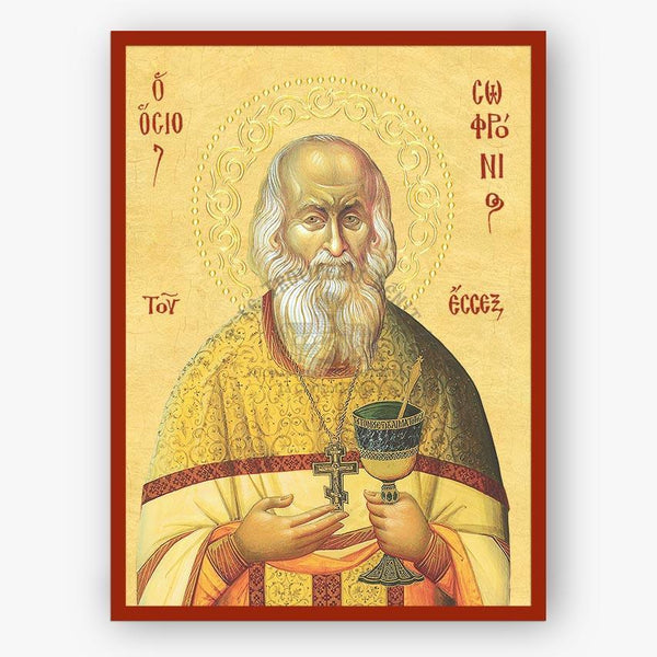 Saint Sophrony icon wearing a cross and holding a holy cup on a beige background. 