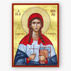 A Byzantine-style religious icon painting of Saint Thekla the Protomartyr on a gold background with a red border. The figure wears a red head covering and blue robe with a white tunic, holds a red cross, and holds a book.