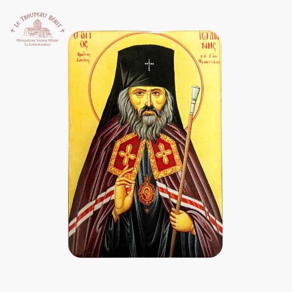 Icon of a religious figure with a yellow background with 'Troupeau Benit' logo branding