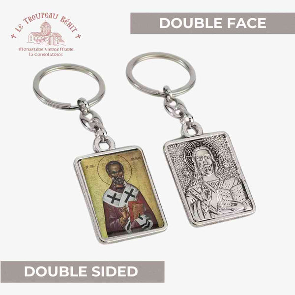 Double sided keychain with Saint Nicholas and Christ with visible 'Troupeau Benit' logo branding