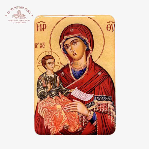 Icon of the Mother of God holding Christ on a beige background with visible 'Troupeau Benit' logo branding in the top left corne